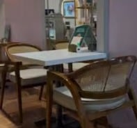 Table by the arched mirror