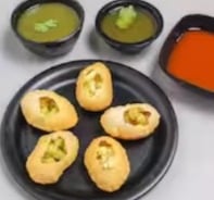 Pani puri with tangy waters